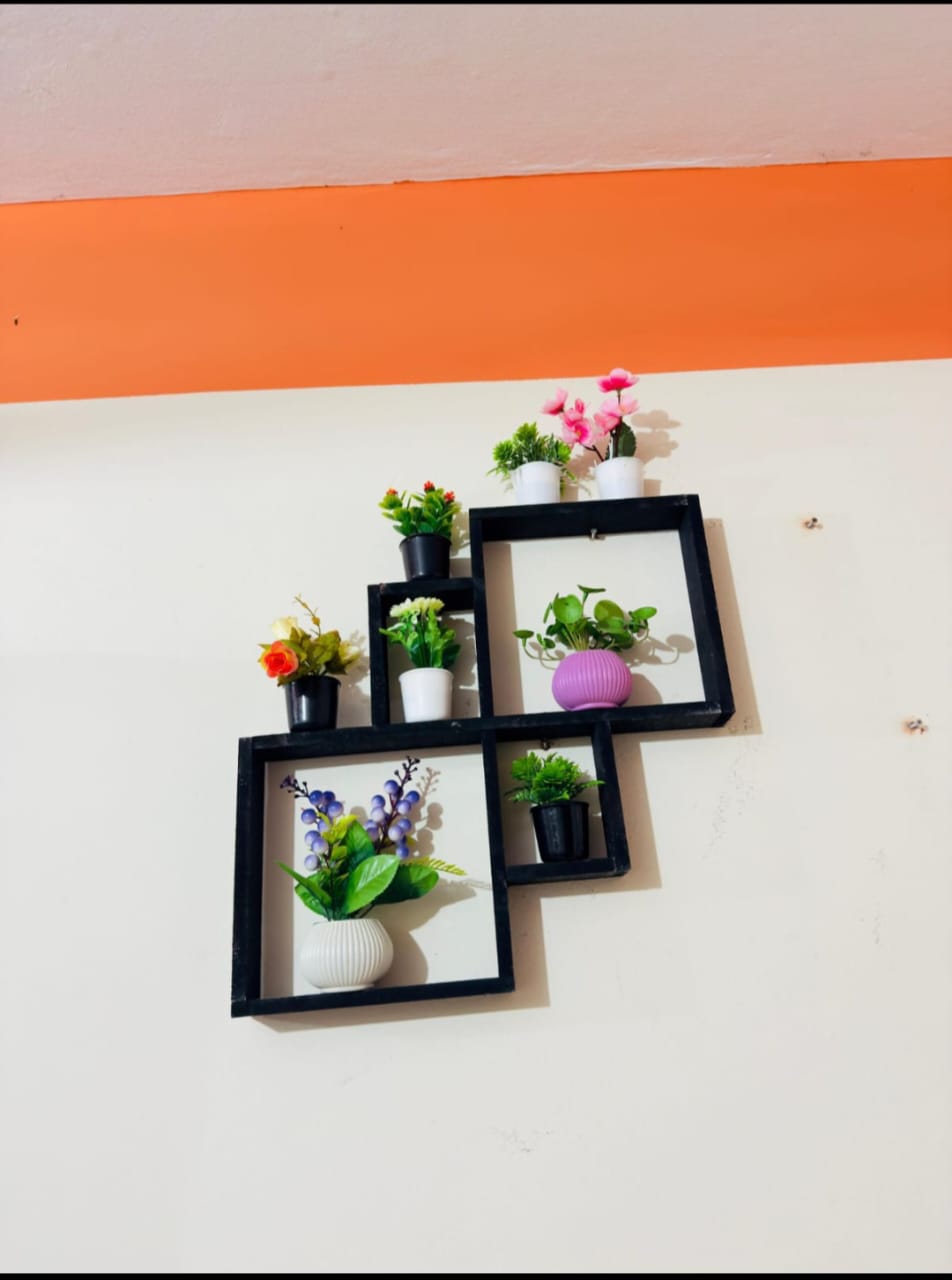 Wall shelf with artificial flowers